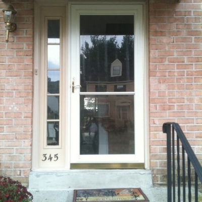 Self Storing Storm Door